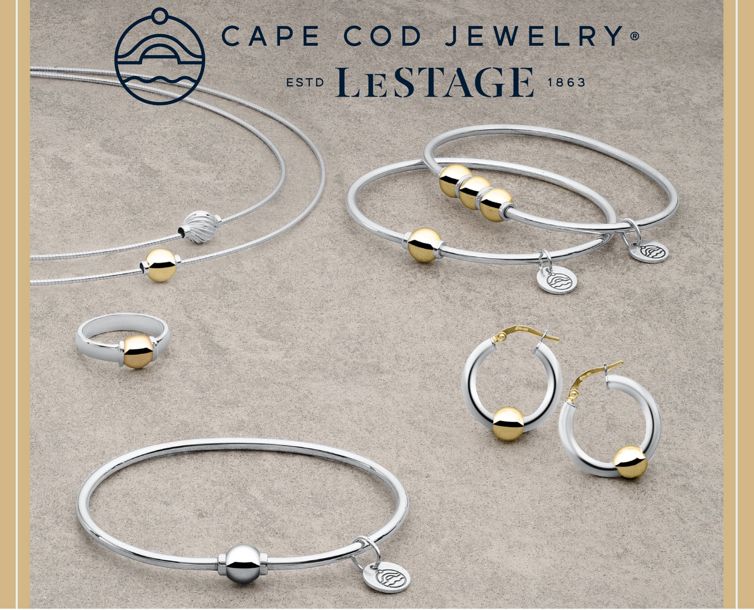 Cape Cod Jewelry by Esto LeStage 1863, displayed on sandy beach, symbolizing coastal elegance and timeless beauty.